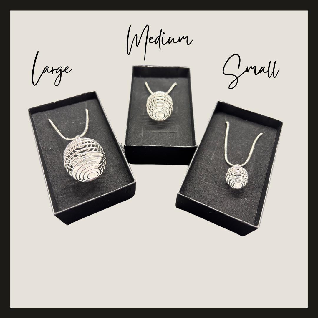 Clear Quartz Spiral Cage Necklace