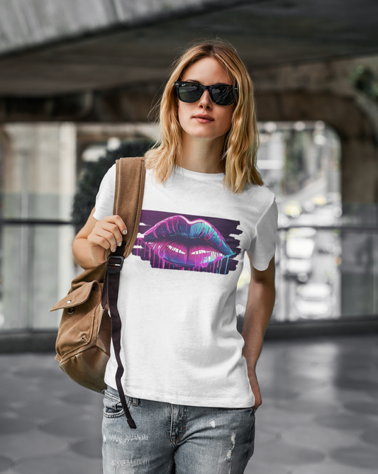 Add a splash of urban flair to your wardrobe with our women's graffiti lips t-shirt, where bold design meets unbeatable comfort. Available in a range of sizes, this tee is a must-have for urban fashionistas and art lovers alike. Step into the world of street art with confidence and make a colourful statement wherever you go. Featuring a dynamic graffiti-inspired design of luscious lips, this tee is a standout piece for those who love to make a statement.