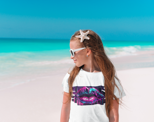 Add a splash of urban flair to your kids wardrobe with our unisex graffiti lips t-shirt, where bold design meets unbeatable comfort. Available in a range of sizes, this tee is a must-have for urban fashionistas and art lovers alike. Step into the world of street art with confidence and make a colourful statement wherever they go. Featuring a dynamic graffiti-inspired design of luscious lips, this tee is a standout piece for those who love to make a statement.