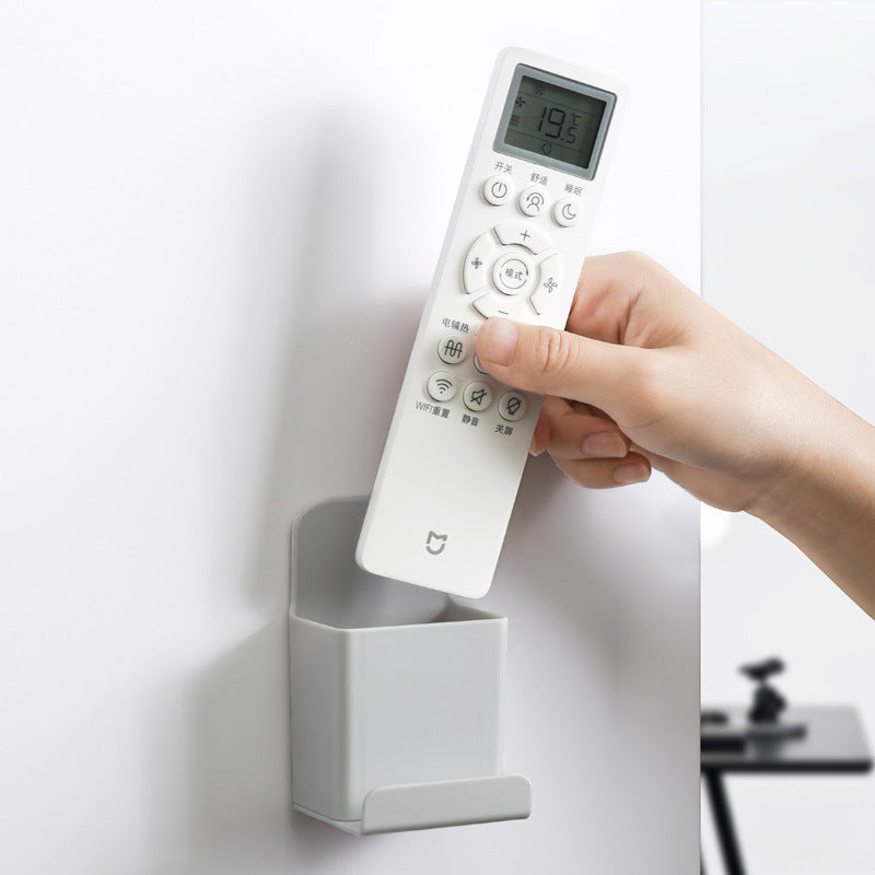 Wall-mounted remote control storage box storage rack