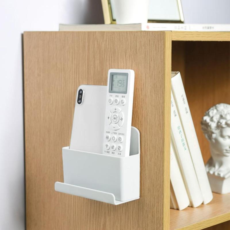 Wall-mounted remote control storage box storage rack