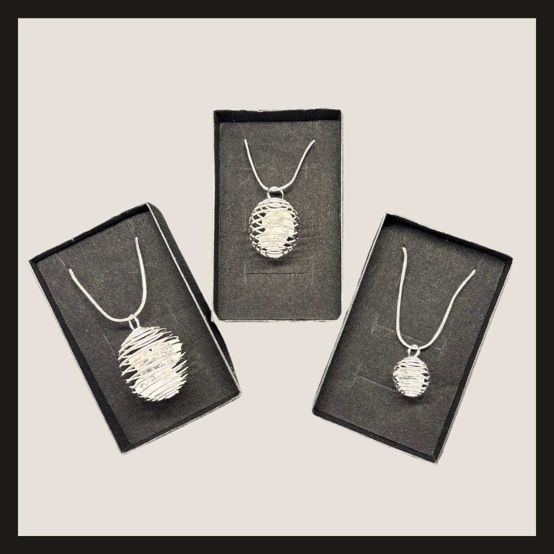 Clear Quartz Spiral Cage Necklace