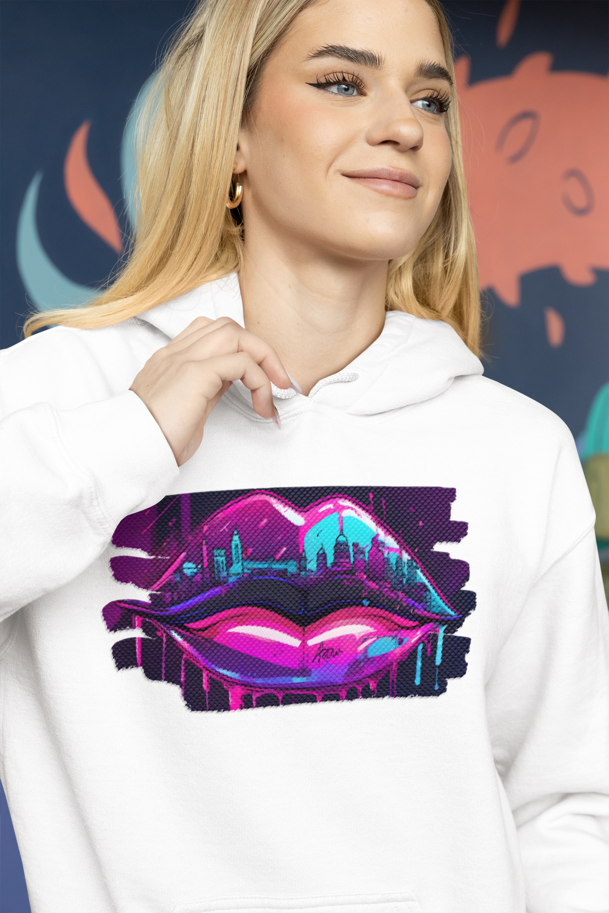 Add a splash of urban flair to your wardrobe with our unisex graffiti lips hoodie, where bold design meets unbeatable comfort. Available in a range of sizes, this tee is a must-have for urban fashionistas and art lovers alike. Step into the world of street art with confidence and make a colourful statement wherever you go. Featuring a dynamic graffiti-inspired design of luscious lips, this hoodie is a standout piece for those who love to make a statement.