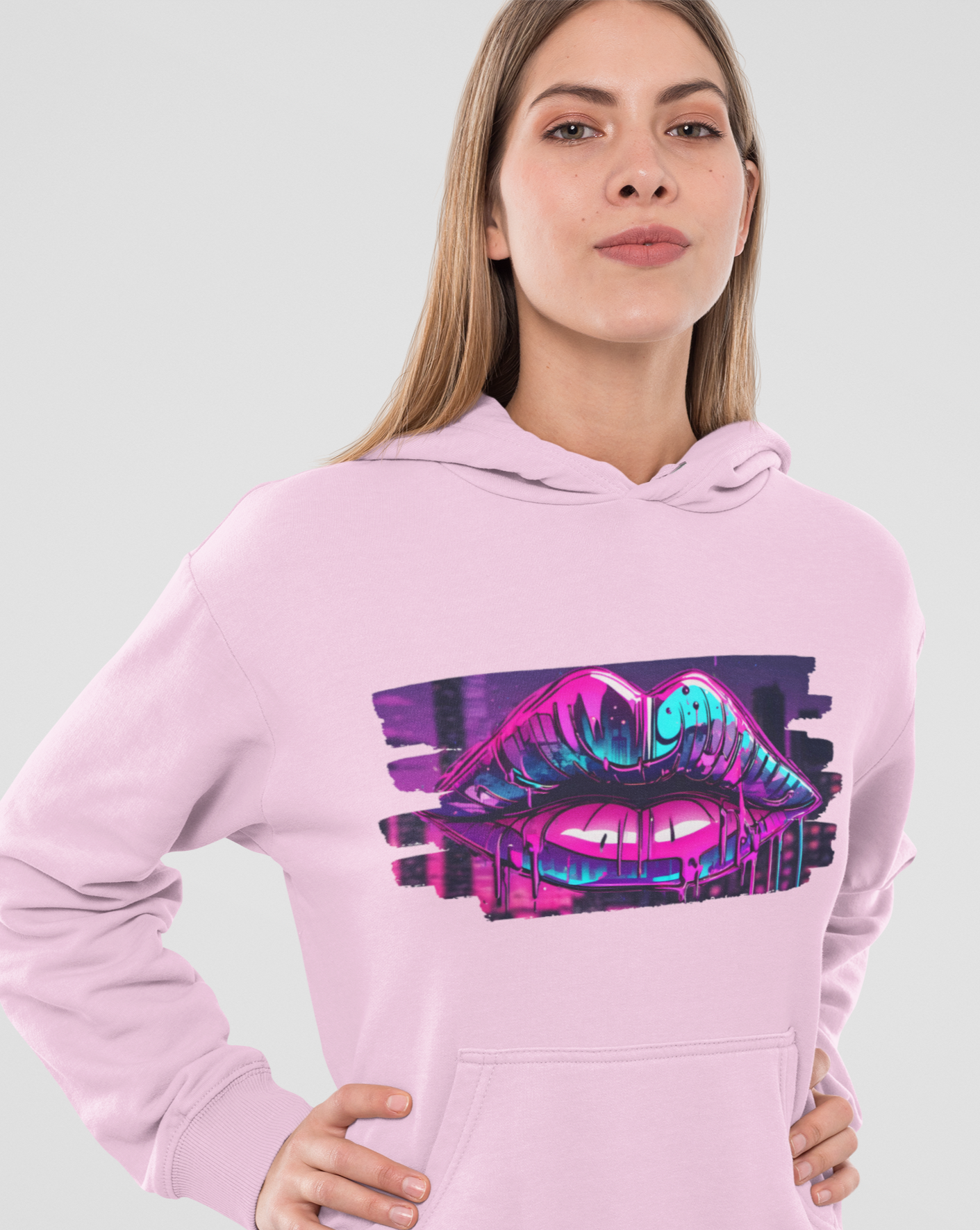 Add a splash of urban flair to your wardrobe with our unisex graffiti lips hoodie, where bold design meets unbeatable comfort. Available in a range of sizes, this tee is a must-have for urban fashionistas and art lovers alike. Step into the world of street art with confidence and make a colourful statement wherever you go. Featuring a dynamic graffiti-inspired design of luscious lips, this hoodie is a standout piece for those who love to make a statement.