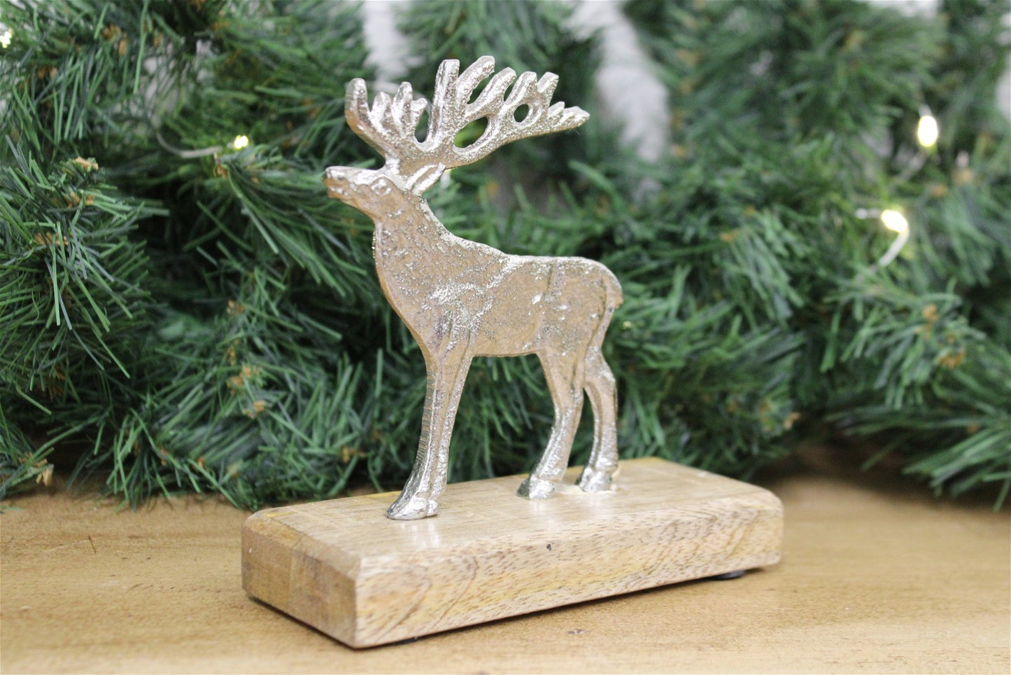 Silver Reindeer On Wood Base