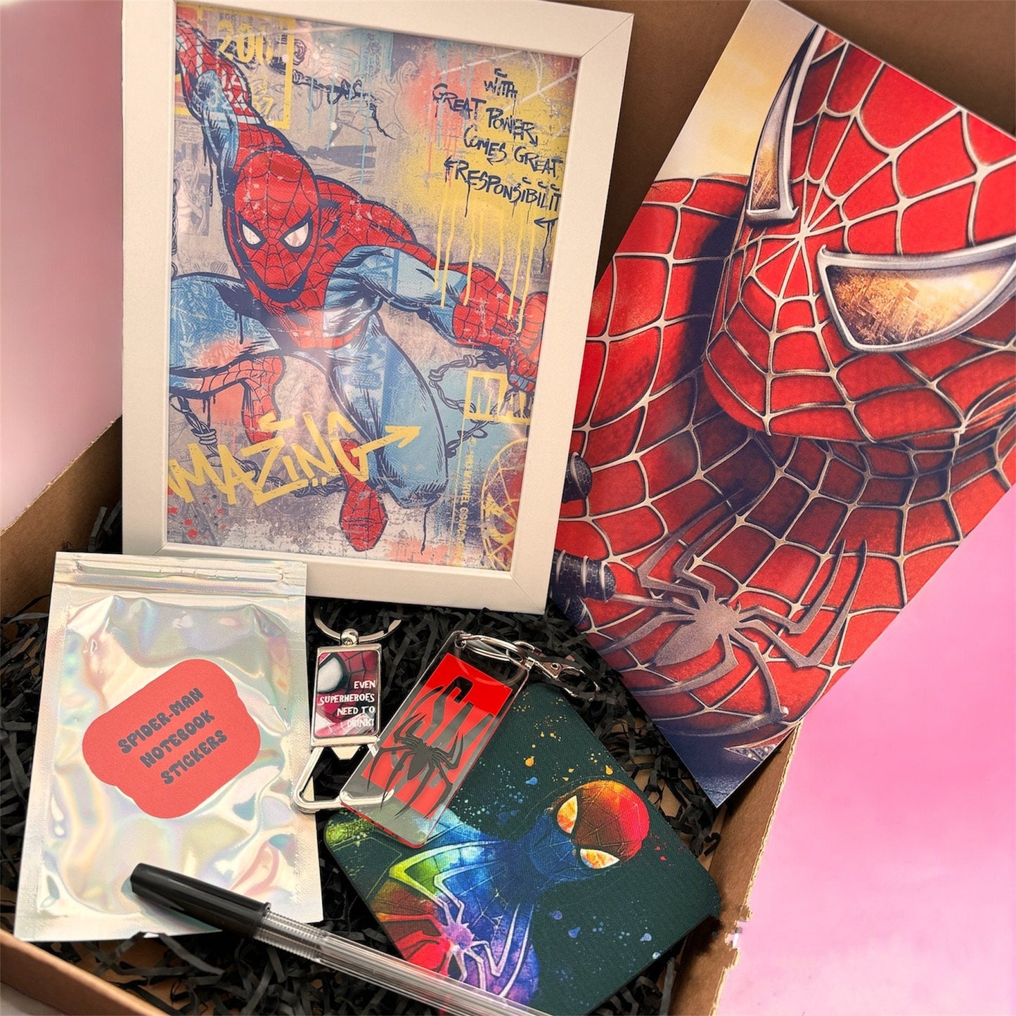 Hand-Made Spider-Man Gift Set - Exclusive 5x7 Foil Print, Notebook, and More!  Our Spider-Man Gift Set is a sensational collection celebrating everyone's favorite wall-crawler! Dive into the superhero universe with a framed 5x7 high-gloss foil print of The Amazing Spider-Man comic cover, accompanied by a range of themed accessories.